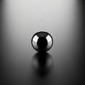 Sphere rests on a smooth dark surface. The background is a gradient Royalty Free Stock Photo