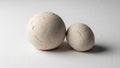 The spheres differ in size with one noticeably larger than the other Royalty Free Stock Photo