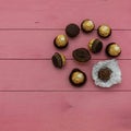 Spherical chocolates wrapped in golden foil Royalty Free Stock Photo