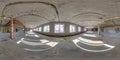 Spherical 360 hdri panorama in abandoned interior of large empty room as warehouse, hangar or gallary with rays of sun through Royalty Free Stock Photo