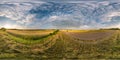 Spherical hdri panorama 360 degrees angle view near asphalt road among fields in summer evening sunset with cirrocumulus clouds in Royalty Free Stock Photo