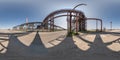spherical 360 hdri panorama near industrial architecture and communications, pipes and metal structures in equirectangular