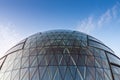 Roof and glass facade of modern skyscraper, blue sky Royalty Free Stock Photo