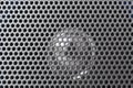 Spherical silver speaker grille Royalty Free Stock Photo