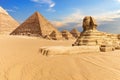 The Sphinx of Giza next to the Pyramids in the desert, Egypt Royalty Free Stock Photo