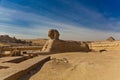 Side View of Sphinx with Rocks Royalty Free Stock Photo