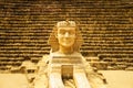 Sphinx model with pyramid background Royalty Free Stock Photo