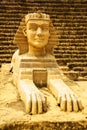 Sphinx model with pyramid background Royalty Free Stock Photo