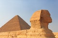 Sphinx and the Pyramid of Cheops at Giza Royalty Free Stock Photo