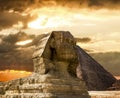 The Sphinx and the pyramid of Cheops in Giza Egipt at sunset Royalty Free Stock Photo