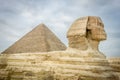 The Sphinx and Pyramid of Khufu Royalty Free Stock Photo