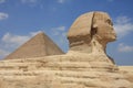 Sphinx and Pyramid of pharaoh Cheops. Giza in Egypt. Royalty Free Stock Photo