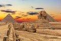 The Sphinx and the Pyramids at sunset, beautiful view, Giza, Egypt Royalty Free Stock Photo