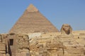 The Sphinx stands proud in front of the Pyramid of Cheops, Cairo, Egypt Royalty Free Stock Photo