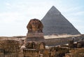 Sphinx statue and Cheops pyramid in Giza Egypt Royalty Free Stock Photo