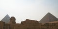 Sphinx statue and pyramid in Giza Egypt. Ancient architecture Royalty Free Stock Photo