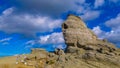 Sphinx stony landmark in Bucegi national park against a blue sky Royalty Free Stock Photo