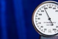 Sphygmomanometer closeup blood pressure measurment medical equipment. Tonometer, part of medical tool on blue background Royalty Free Stock Photo