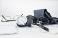 Sphygmomanometer on the working table of a cardiologist. Tonometer, electrocardiogram and notepad for records.