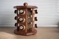 Spice rack full of a variety of different spices and herb on a kitchen table Royalty Free Stock Photo