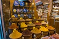 Spice shop with assortment of different spices in clay pots