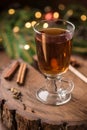 Spiced Apple Cider Mulled Sangria in glass cup on wooden background. Hot drinks for Christmas. Royalty Free Stock Photo