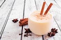 Spiced Christmas eggnog close up on a white wood background Royalty Free Stock Photo