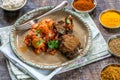 Spiced lamb cutlets with Bombay aloo