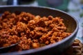 Spiced pork meat fried in olive oil is called zorza in the community of Galicia in Spain