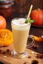 Spiced pumpkin latte. Delicious season beverage with coffee, pumpkin syrup, whipped cream and cinnamon.