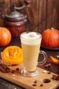 Spiced pumpkin latte. Delicious season beverage with coffee, pumpkin syrup, whipped cream and cinnamon.