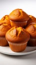 Spiced pumpkin muffins, autumn\'s delight, on a clean, bright white background