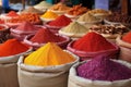 spices arranged in colorful heaps at an open-air market Royalty Free Stock Photo