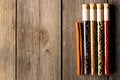 Spices in beakers on wooden table Royalty Free Stock Photo