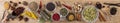 Variety of colorful spices on wooden background, top view, banner Royalty Free Stock Photo
