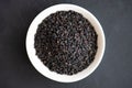 Spices for cooking - black sesame seeds close-up Royalty Free Stock Photo