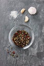 Spices: garlic, peppercorns, sea salt on a stone