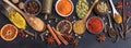 Spices and herbs. Colorful spices flat lay on wooden table Royalty Free Stock Photo