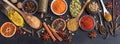 Spices and herbs. Colorful spices flat lay on wooden table