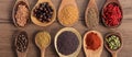 Spices and herbs. Colorful spices on wooden table, banner Royalty Free Stock Photo