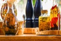 Spices and herbs ingredients in decorative glass bottles,kitchen decoration Royalty Free Stock Photo
