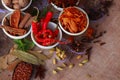 spices and herbs on kitchen or wooden table,Colorful spices and herbs for cooking with rotation teblet, Jaiphal, Star Anise, Royalty Free Stock Photo