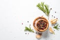 Spices and herbs over white stone table top view. Royalty Free Stock Photo