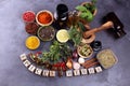 Spices and herbs on table. Food and cuisine ingredients with pepper and spices herbs sign with wooden cubes