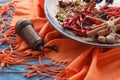 Spices mill and various aromatic herbs on plate Royalty Free Stock Photo