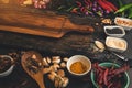 Spices for use as cooking ingredients on a wooden background with Fresh organic vegetables on wood. Healthy food herbs and spices Royalty Free Stock Photo