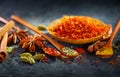 Spices. Various Indian Spices on black stone table. Spice and herbs on slate background. Assortment of Seasonings, condiments Royalty Free Stock Photo