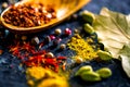 Spices. Various Indian spices on black stone table. Spice and herbs on slate background