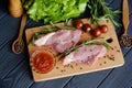 Fresh steaks and vegetables before cooking Royalty Free Stock Photo