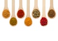 Spices in wooden spoons Royalty Free Stock Photo